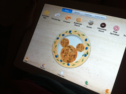Lily-Ann is making Mickey pancakes on her breakfast app.